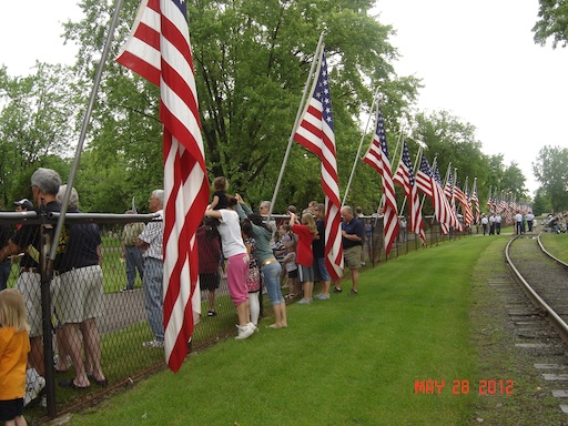 Flags Along Fence By Third Avenue Gate