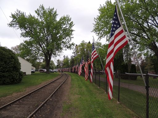 Flags Along Fence By Third Avenue Gate